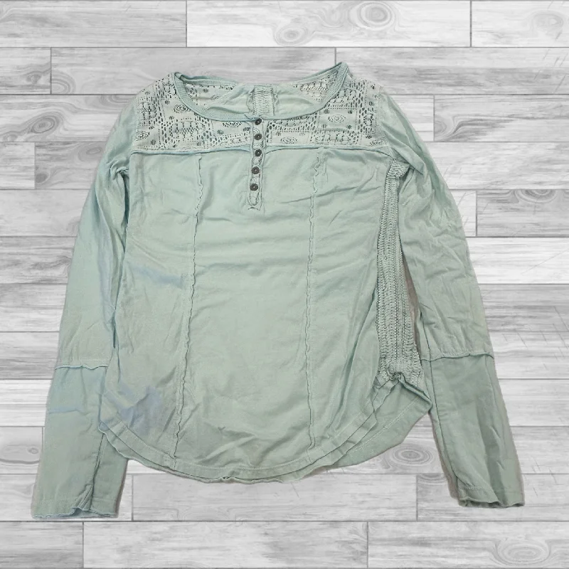 women's tops for those who want to wear versatile pieces that can be dressed up or downTop Long Sleeve By Free People In Teal, Size: L